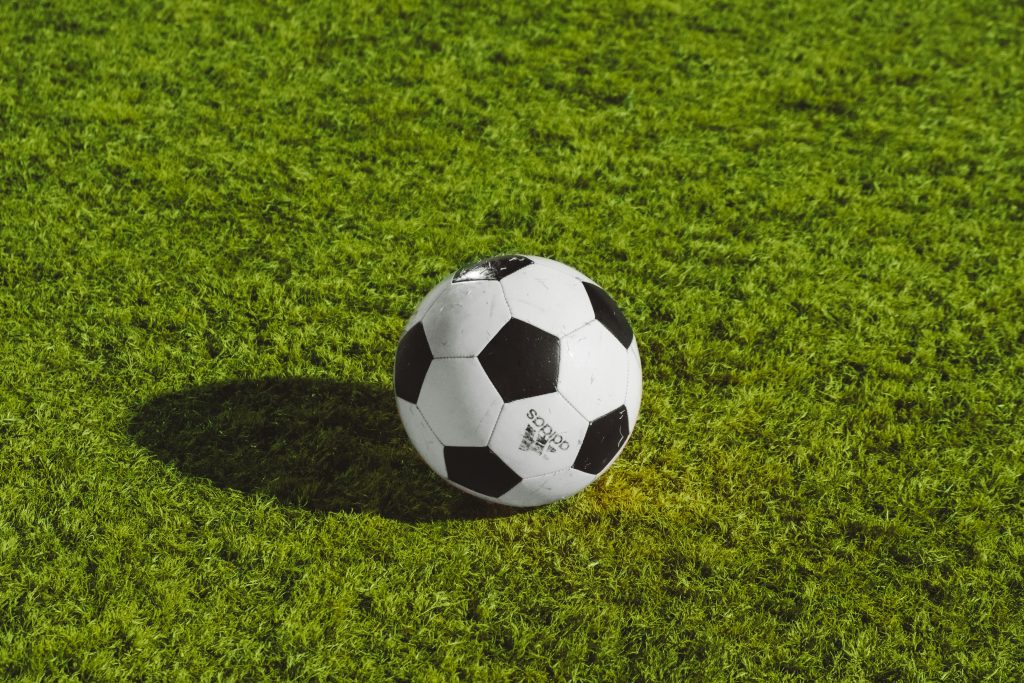 Football on a pitch