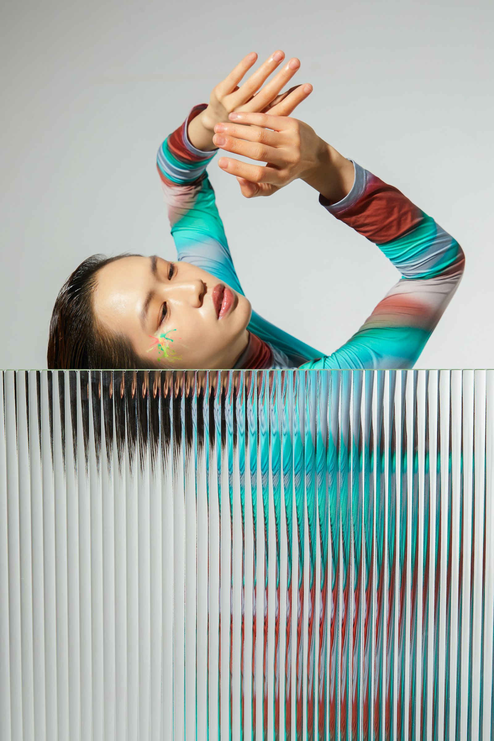 An abstract, fragmented image of a dancer's pose, representing the concept musical format